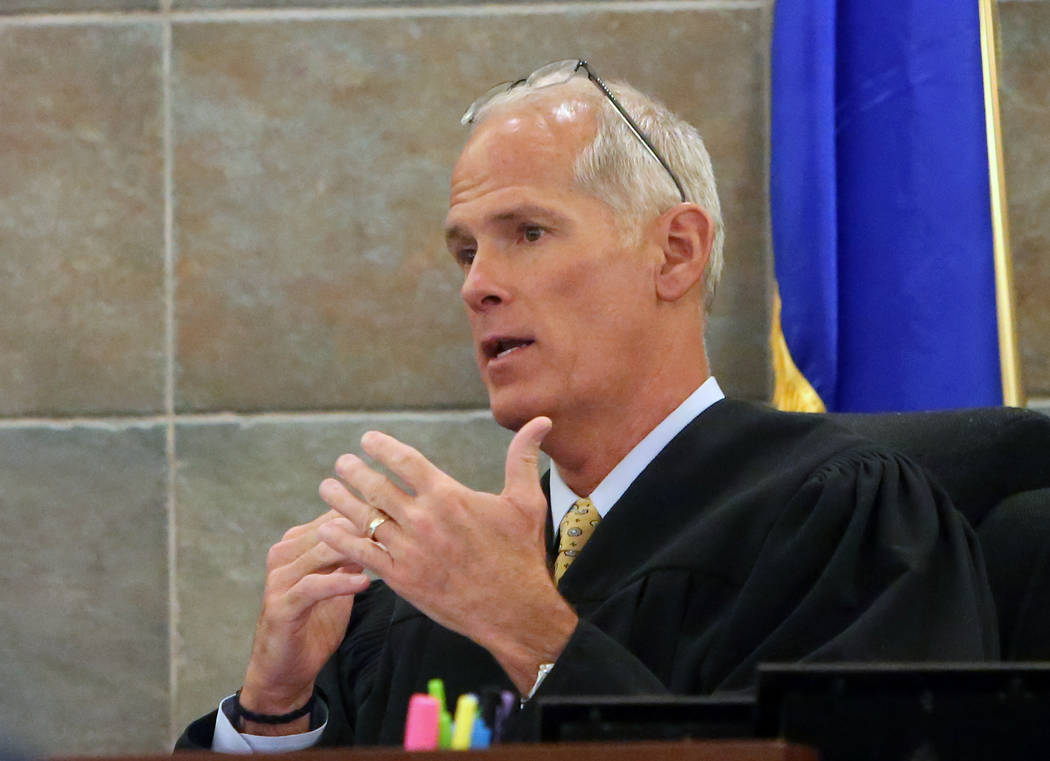 District Judge Douglas Herndon instructs the jury on Tuesday, May 2, 2017, at the Regional Justice Center, in the trial of Frederick Richards, a former Bellagio club host accused of drugging and r ...