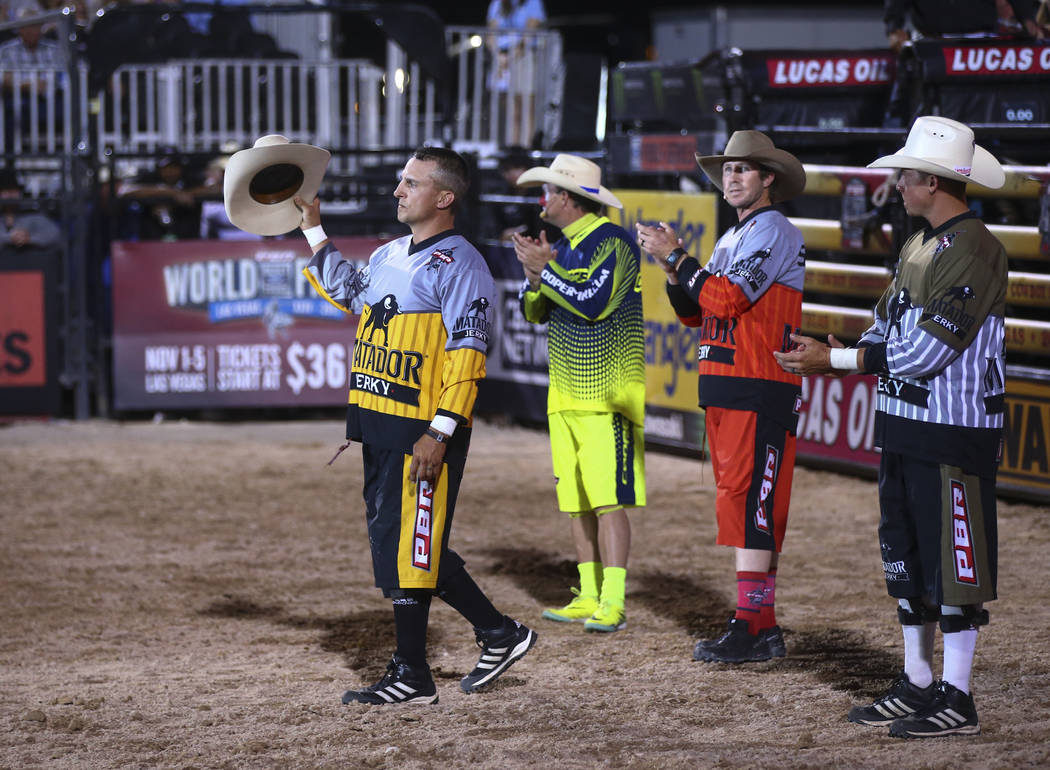 Professional Bull Riders bullfighters, from left, Cody Webster, Seth  "Shorty" Gorham and Frank Newsom prepare for the Last Cowboy  Standing event at Las Vegas Village in Las Vegas …