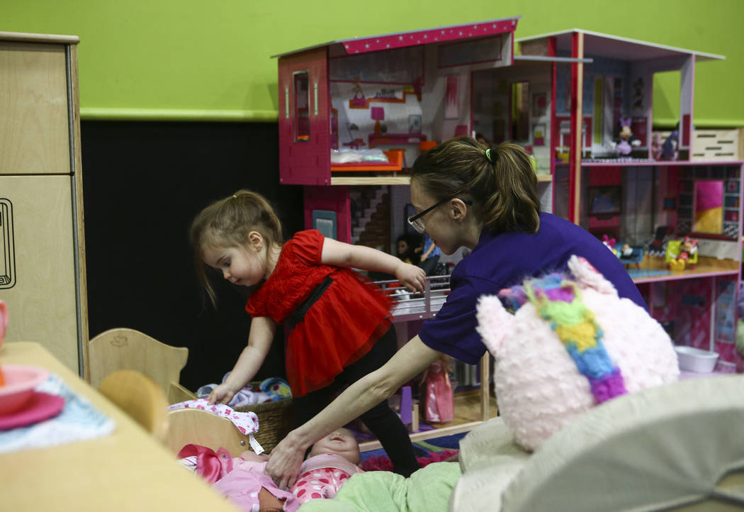 Kathryn Anderson, right, helps Emma at Kid's Quest at the Red Rock Resort hotel-casino in Las Vegas on Wednesday, May 10, 2017. Chase Stevens Las Vegas Review-Journal @csstevensphoto