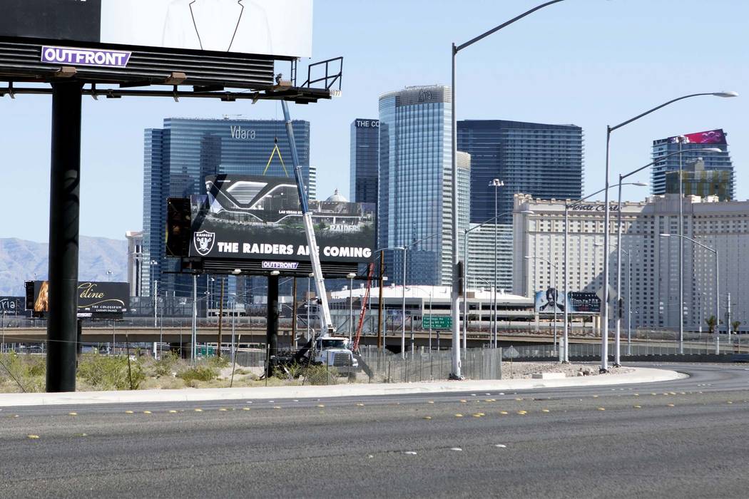 A Raiders billboard stands at the northeast corner of Dean Martin Drive near Hacienda Avenue at the team's Russell Road stadium site in Las Vegas. (Heidi Fang/Las Vegas Review-Journal) @HeidiFang