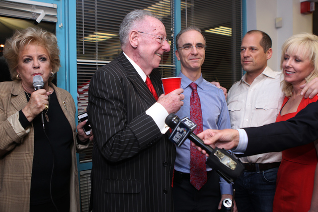 Mayor Carolyn Goodman, from left, gives a victory speech to her supporters with her husband Oscar, and children Oscar Jr., Ross, and Cara, at her re-election night party at her campaign headquarte ...