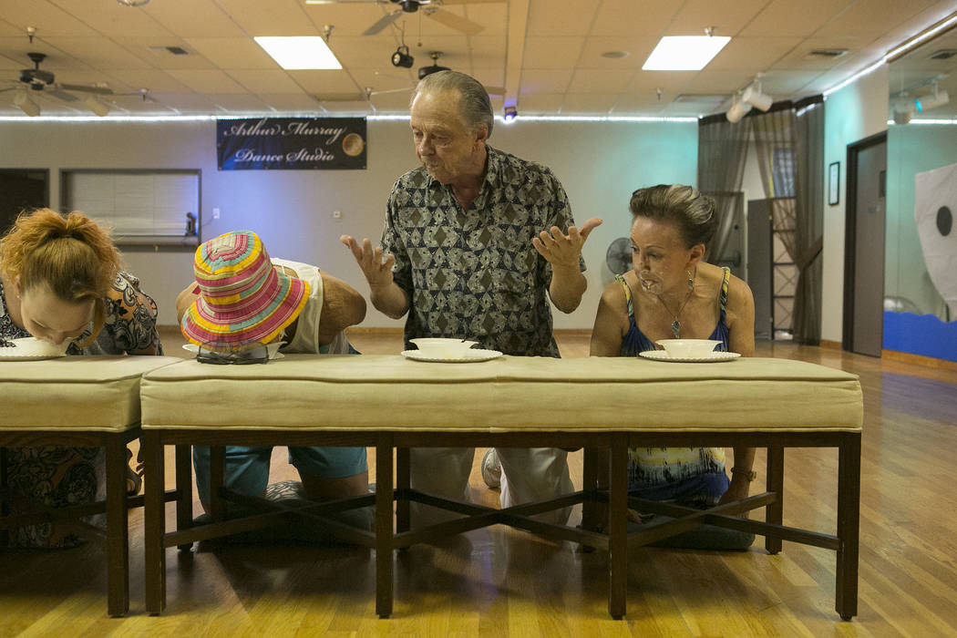 Toni Brasted, far right, and husband Lee Brasted, second from right, participate in an ice cream competition at Arthur Murray Dance Studio on Thursday, May 11, 2017 in Las Vegas. Bridget Bennett L ...