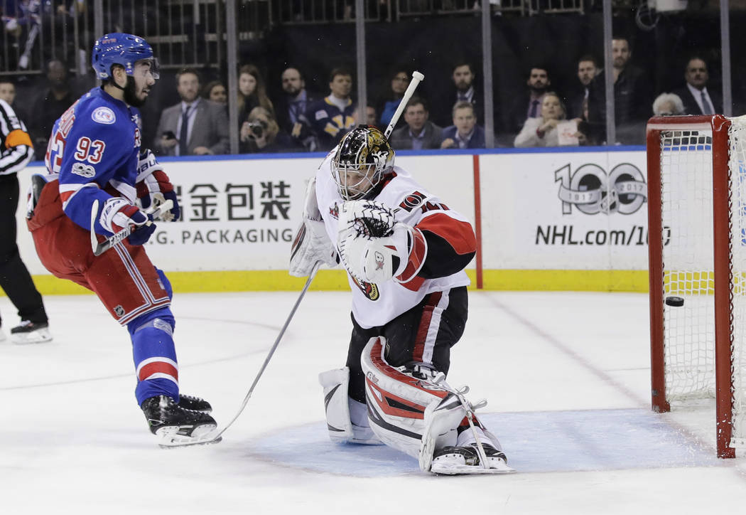 New York Rangers' Mika Zibanejad (93) shoots the puck past Ottawa Senators' Craig Anderson (41) for a goal during the second period of Game 6 of an NHL hockey Stanley Cup second-round playoff seri ...