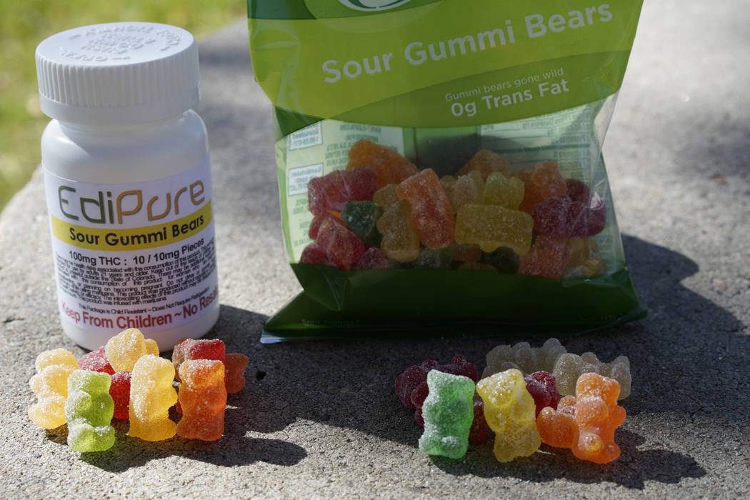 Marijuana-infused sour gummy bear candies (L) are next to regular ones at right in Northglenn, Colorado October 16, 2014. (Rick Wilking/Reuters)