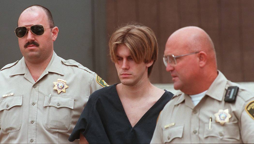 Jeremy Strohmeyer leaves Goodsprings Justice Court in Jean, Nev., flanked by Metropolitan Police Department officers on July 22, 1997. (Jim Laurie/Las Vegas Review-Journal)