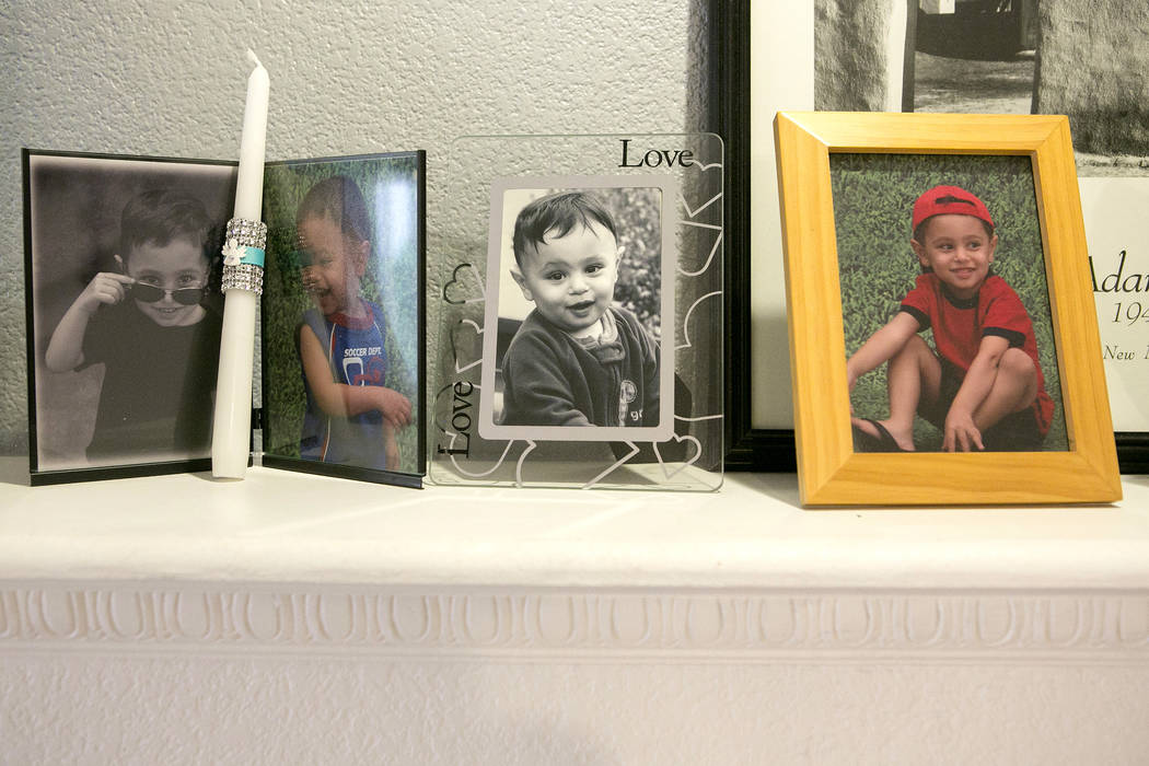 Photos of Zareh Shamirza sit on a mantle at their home on Thursday, May 11, 2017 in Las Vegas. Bridget Bennett Las Vegas Review-Journal @bridgetkbennett