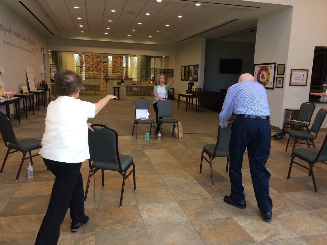 Both caregivers and those afflicted with Parkinson's Disease take part in a class led by Pamela Lappen, certified instructor, April 6, 2017 at Desert Spring United Methodist Church in Summerlin. T ...