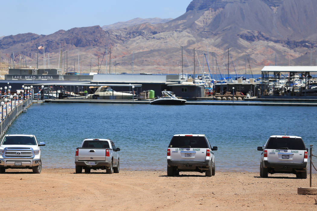 Two National Park Service ranger trucks sit parked at the waterfront of the Lake Mead Marina near Las Vegas on Thursday, May 11, 2017. Brett Le Blanc Las Vegas Review-Journal @bleblancphoto
