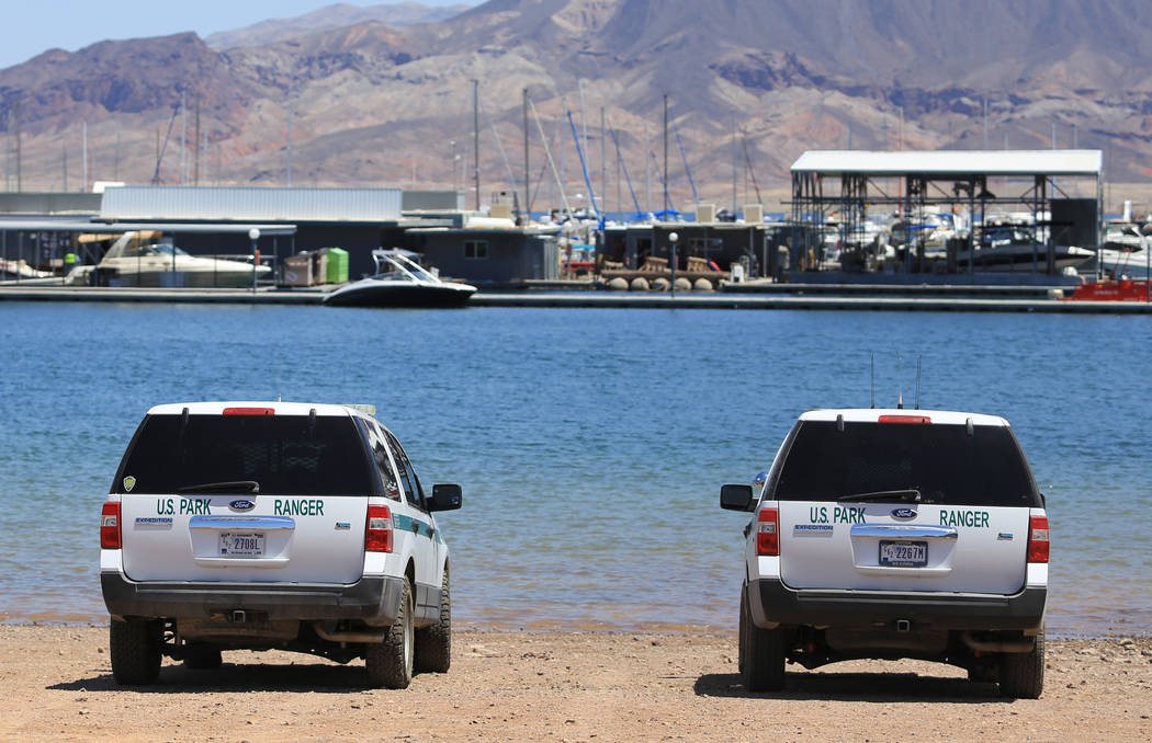 Two National Park Service ranger trucks sit parked at the waterfront of the Lake Mead Marina near Las Vegas on Thursday, May 11, 2017. Brett Le Blanc Las Vegas Review-Journal @bleblancphoto