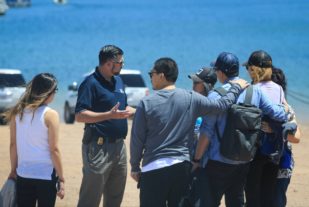 A National Park Service ranger talks to a group of people at Lake Mead Marina near Las Vegas on Thursday, May 11, 2017. Brett Le Blanc Las Vegas Review-Journal @bleblancphoto