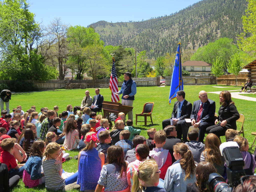 Gov. Brian Sandoval talks with school children before signing Assembly Bill 385 at a ceremony in Genoa on Friday, May 12, 2017. The "Kids in Parks" law gives every Nevada fifth-grader, and anyone  ...
