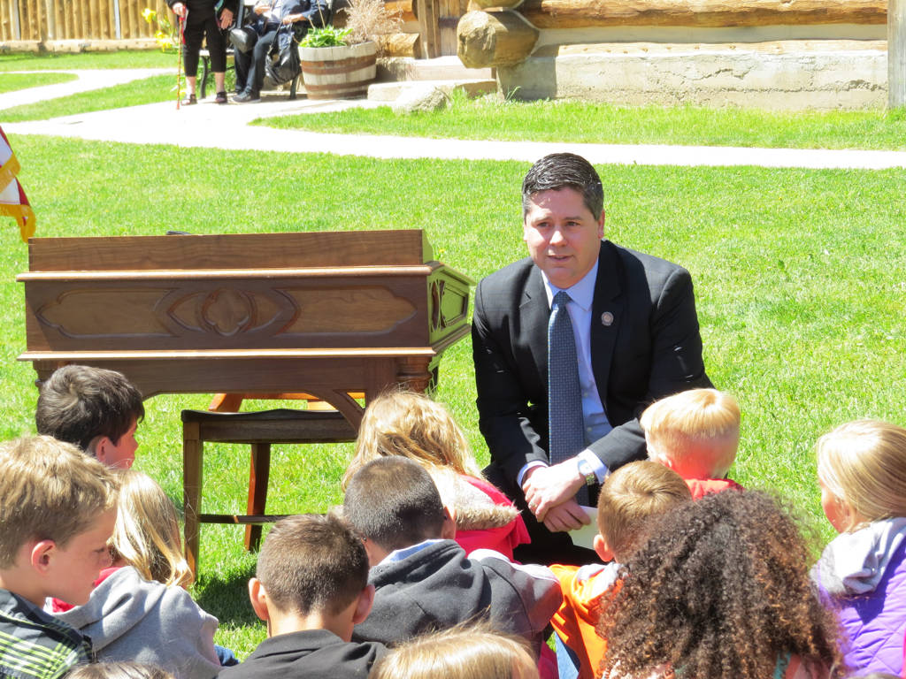 Assemblyman Steve Yeager, D-Las Vegas, talks with school children at a bill signing ceremony in Genoa on Friday, May 12, 2017. Yeager sponsored Assembly Bill 385, the "Kids in Parks" law, that giv ...