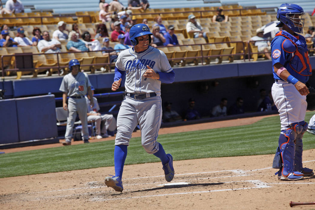 Omaha's infielder Garin Cecchini (7) runs past home plate on Sunday, May 14, 2017, during a game against Las Vegas at Cashman Field in Las Vegas. Rachel Aston Las Vegas Review-Journal @rookie__rae
