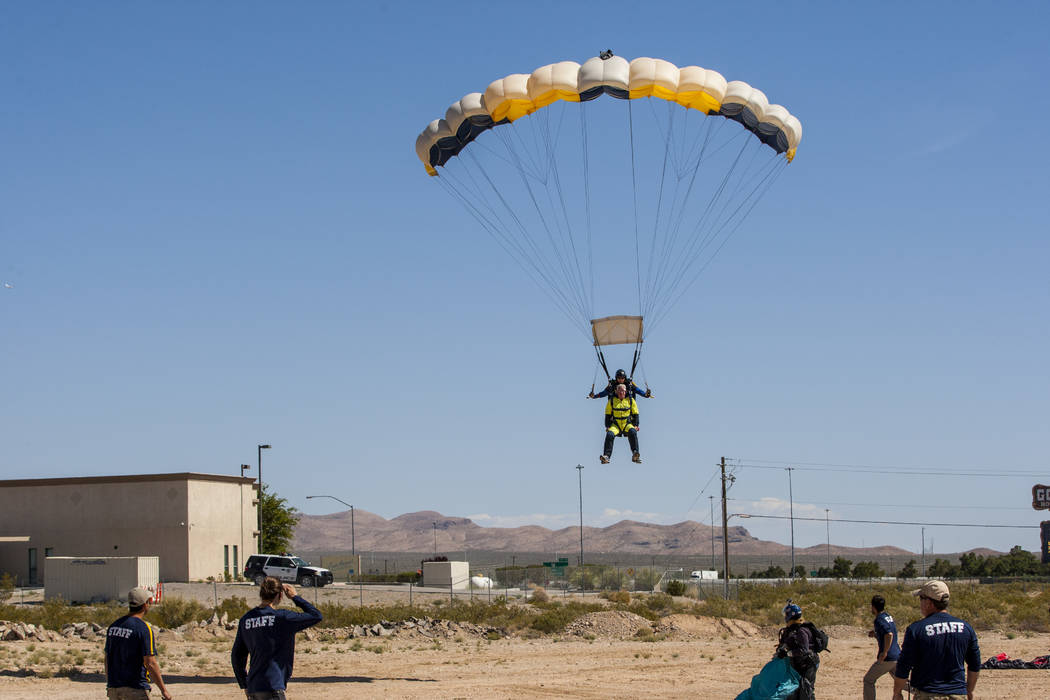 Bill McCrane, who just turned 60, prepares to land with Vegas Extreme Skydiving instructor John Fulk at the Jean Sport Aviation Center in Jean on Tuesday, May 16, 2017. Patrick Connolly Las Vegas ...