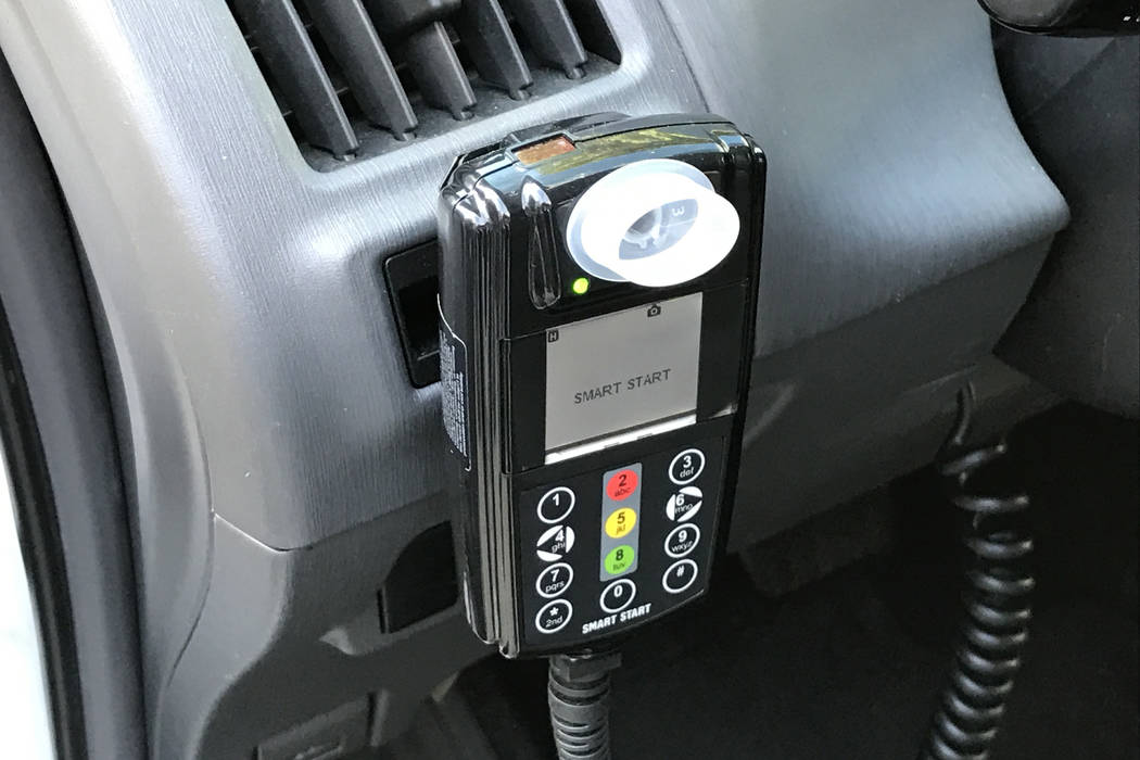 Senate Bill 259 would require all DUI offenders to install ignition interlocks like this one. A driver breathes into the device that is connected to the ignition system, preventing the vehicle fro ...