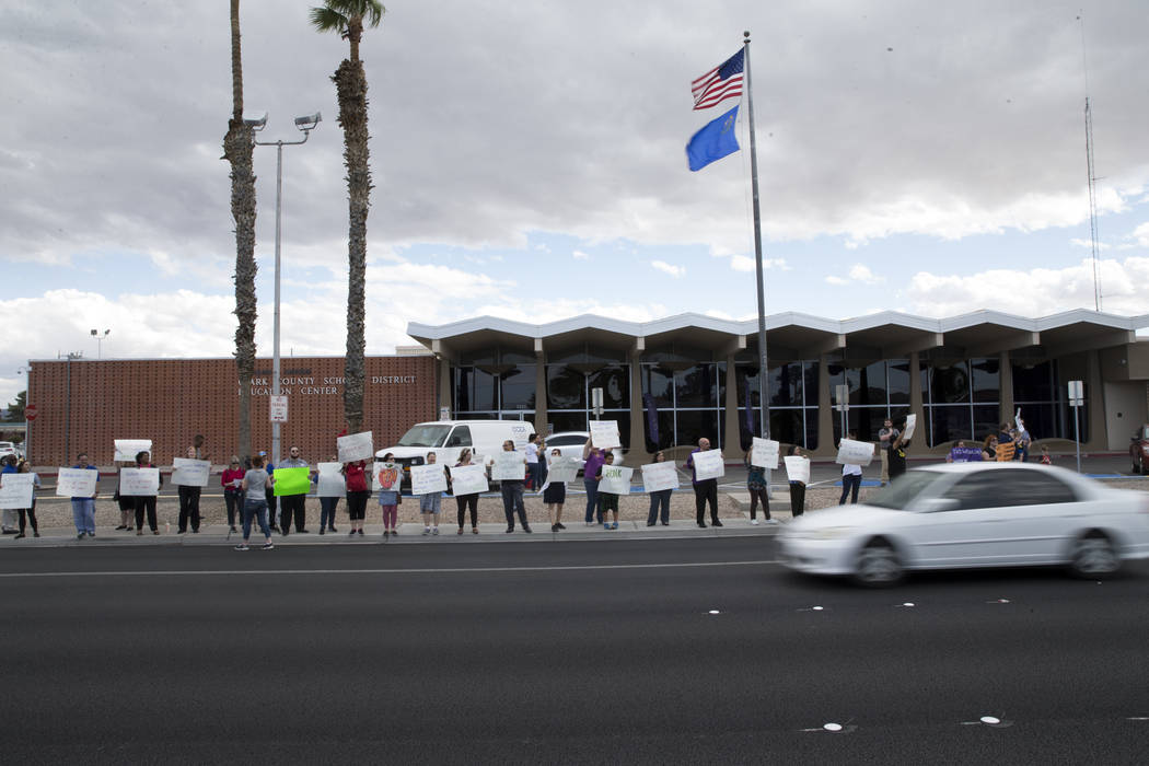 Teachers and supporters rally for affordable health insurance outside of the Clark County School District Education Center before a board meeting on Wednesday, May 17, 2017 in Las Vegas. Erik Verd ...
