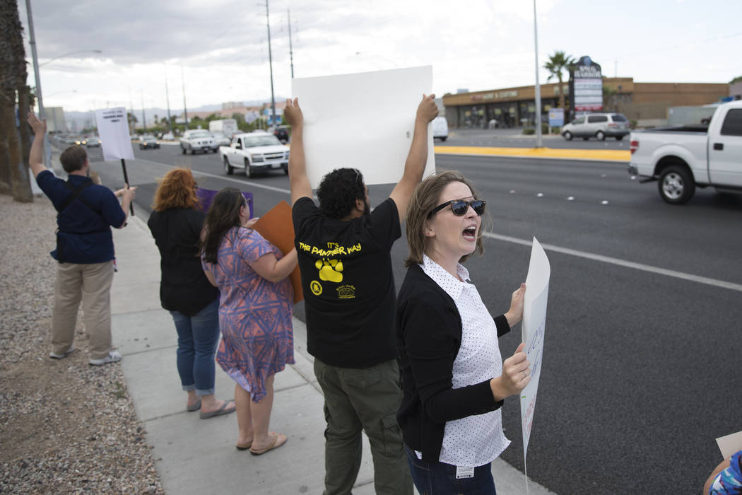 Teachers rally at CCSD board meeting for higher insurance