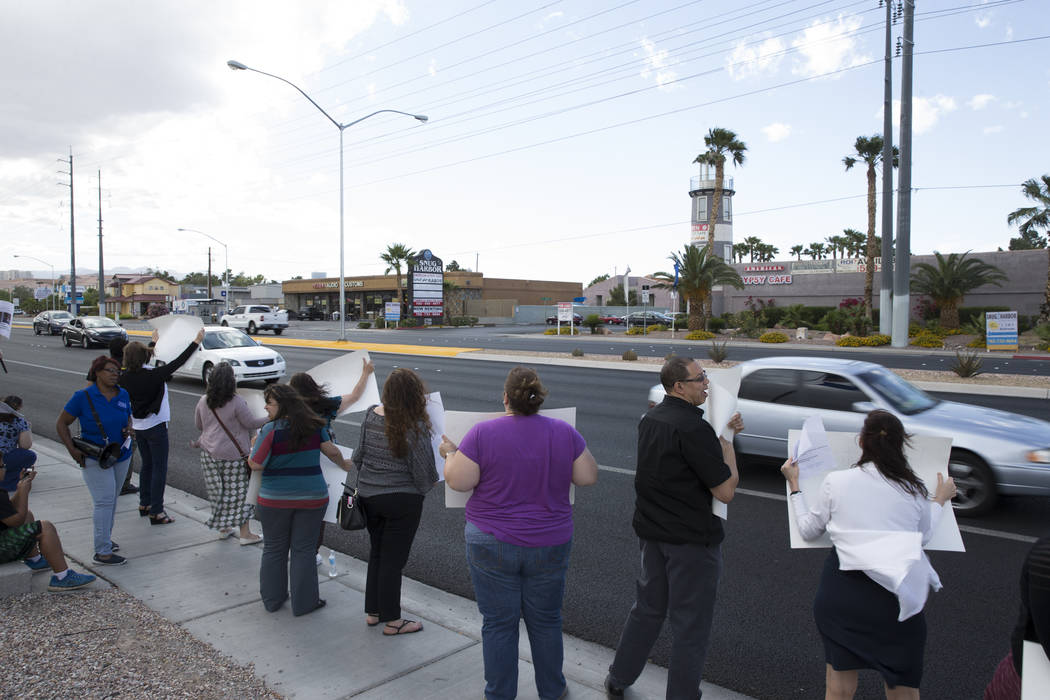Teachers and supporters rally for affordable health insurance outside of the Clark County School District Education Center before a board meeting on Wednesday, May 17, 2017 in Las Vegas. Erik Verd ...