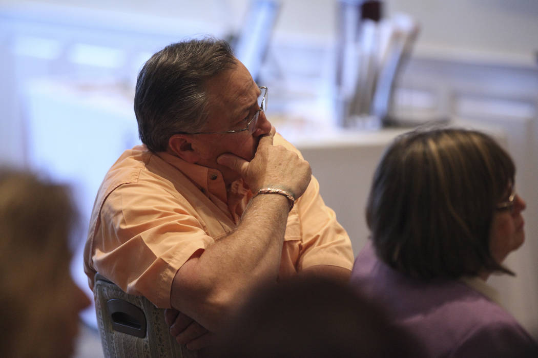 Las Vegas Mayor Pro Tempore Steve Ross, who represents Ward 6, watch as his wife and Ward 6 candidate Kelli Ross speaks at a forum hosted by the Providence Homeowners Association in Las Vegas on W ...