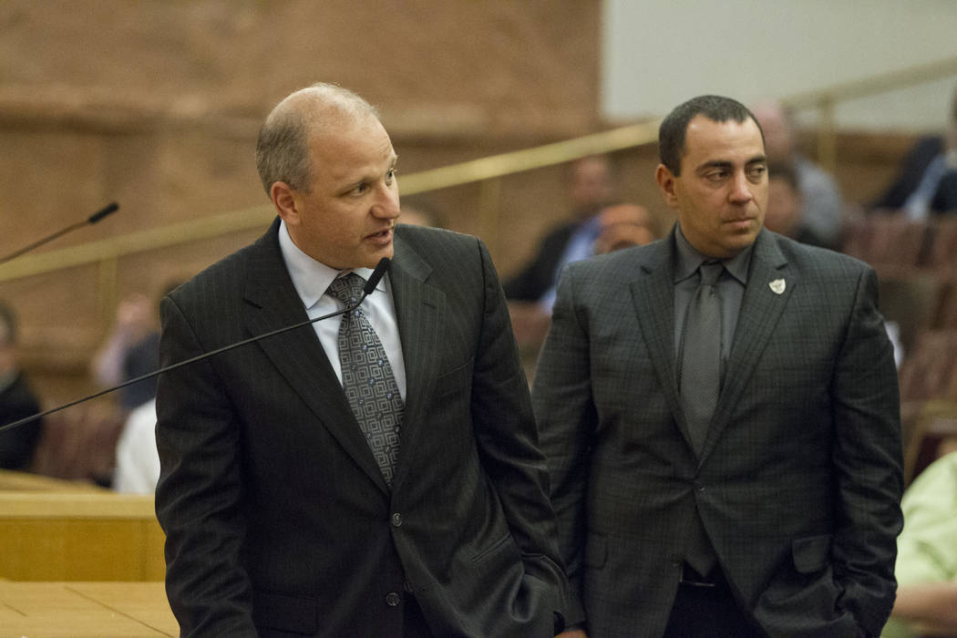 Oakland Raiders president Mac Badain, left, and team's executive vice president general counsel Dan Ventrelle, during a Las Vegas Stadium Authority Board meeting at the Clark County Commission Cha ...