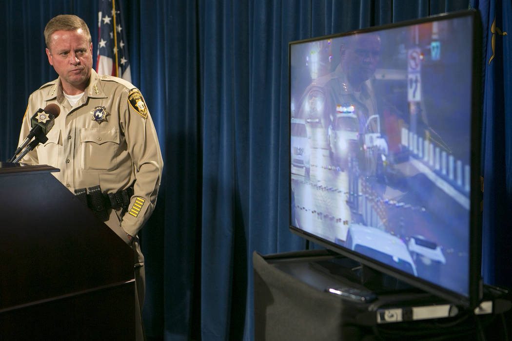 LVMPD undersheriff Keith McMahill plays security footage of the event involving Tashii Brown during a press conference at Las Vegas Metropolitan Police Department Wednesday, May 17, 2017, in Las V ...