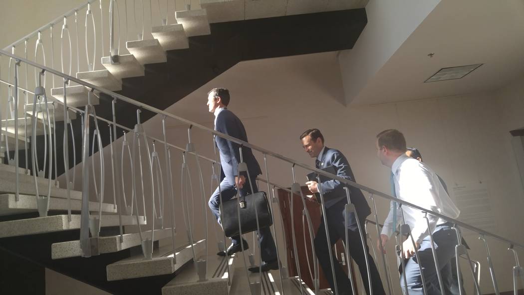 Attorney General Adam Laxalt walks up a staircase of the Legislative Building in Carson City before a meeting with lawmakers about the circumstances of his meeting with Nevada Gaming Control Board ...