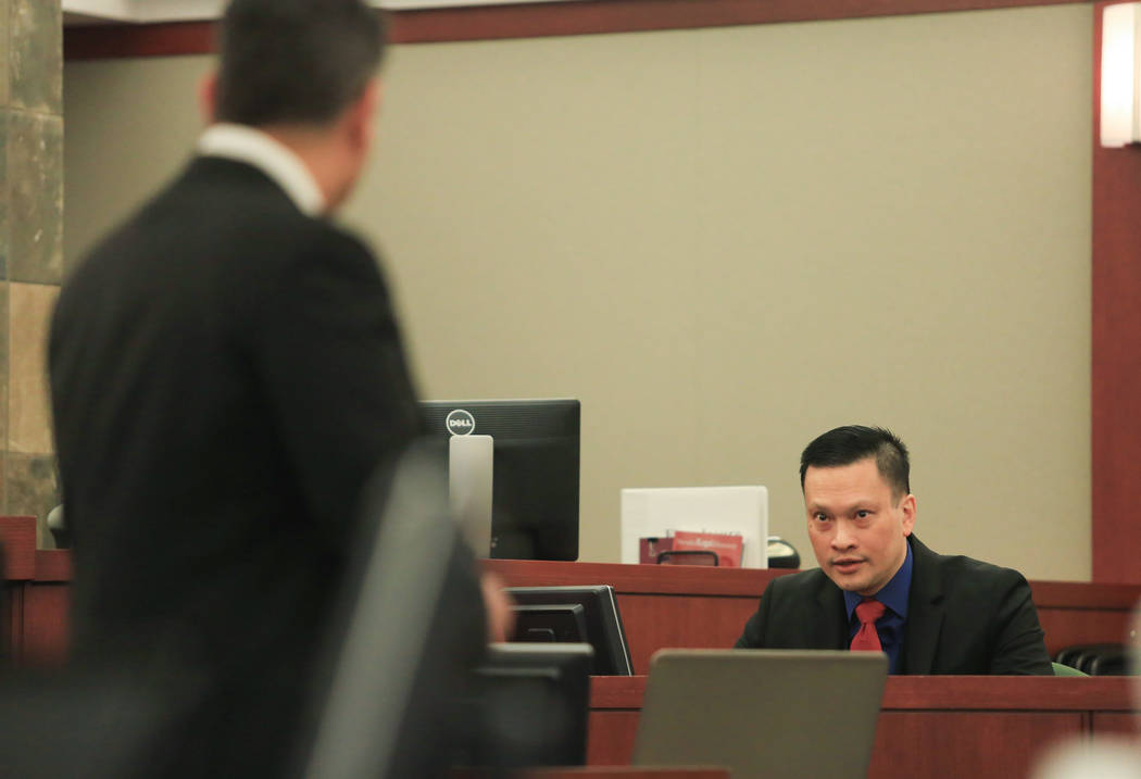 Binh Minh Chung, a doctor who is accused of video taping himself having sex with patients, takes the stand during his trial at the Regional Justice Center in Las Vegas on Thursday, May 18, 2017. B ...