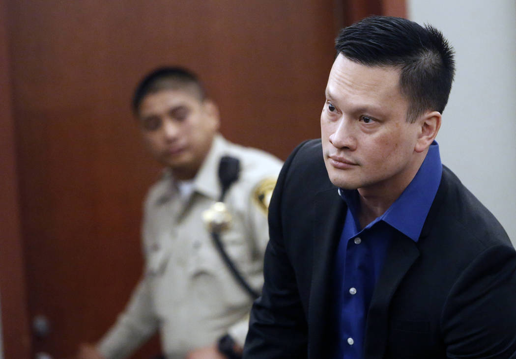 Doctor Binh Minh Chung prepares to leave the courtroom after a jury found him guilty at the Regional Justice Center on Monday, May 22, 2017, in Las Vegas. Chung is accused of videotaping himself h ...