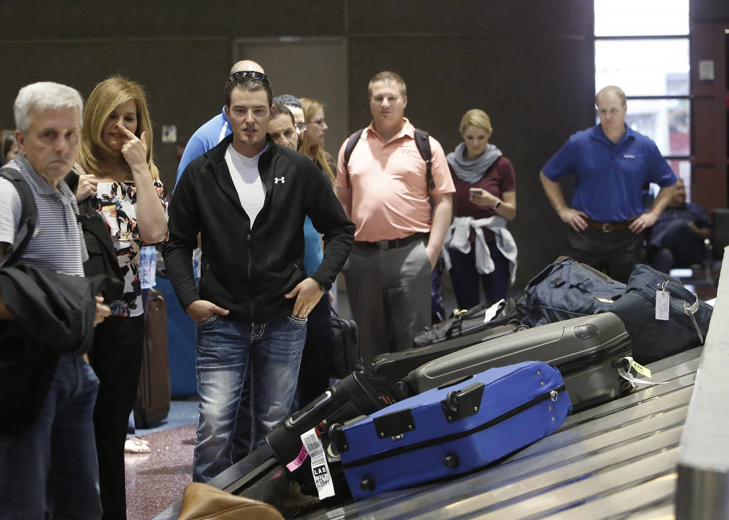 Arriving passengers wait for their luggage at Southwest Airlines baggage claim area at McCarran International Airport on Tuesday, May 23, 2017, in Las Vegas. Bizuayehu Tesfaye Las Vegas Review-Jou ...