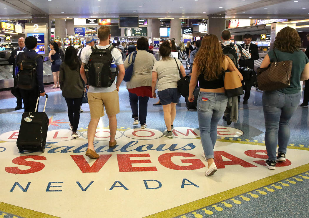 Passengers arrive at McCarran International Airport on Tuesday, May 23, 2017, in Las Vegas. Bizuayehu Tesfaye Las Vegas Review-Journal @bizutesfaye