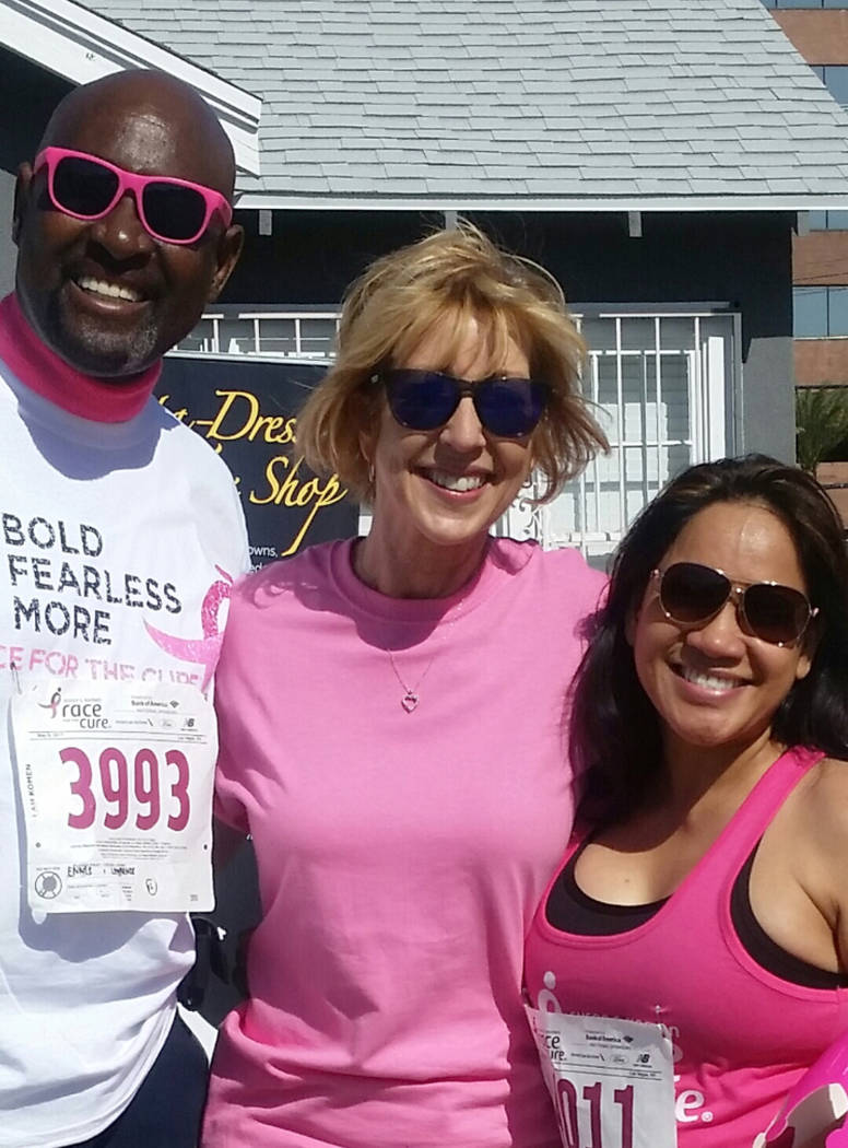 Chapman
Lawrence and Gloria Ennis flank KLAS-TV weatherwoman Sherry Swensk during the annual Susan G. Komen Race for the Cure on May 6 in downtown Las