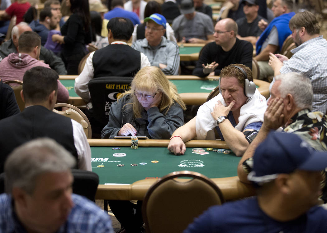 People play poker at the Rio Convention Center on Tuesday, May 30, 2017 in Las Vegas.  The 48th annual WSOP begins Wednesday and will continue for the following seven and a half weeks. Bridget Ben ...