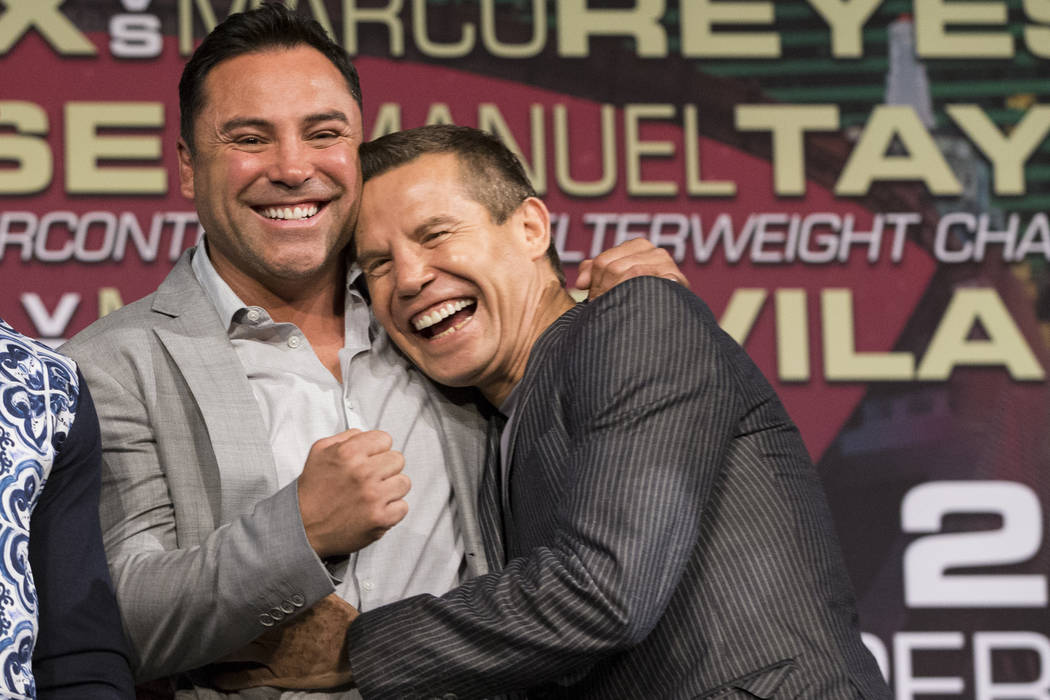 Former Mexican boxers Oscar De La Hoya, left, and Julio Cesar Chavez during a press conference at MGM Grand hotel-casino on Wednesday, May 3, 2017. (Erik Verduzco/Las Vegas Review-Journal)@Erik_Ve ...