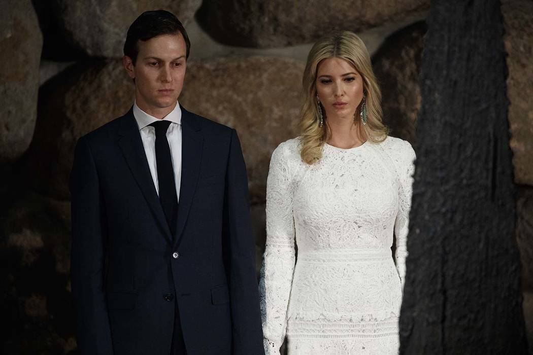 In this May 23, 2017, photo, White House senior adviser Jared Kushner, left, and his wife Ivanka Trump watch during a visit by President Donald Trump to Yad Vashem to honor the victims of the Holo ...