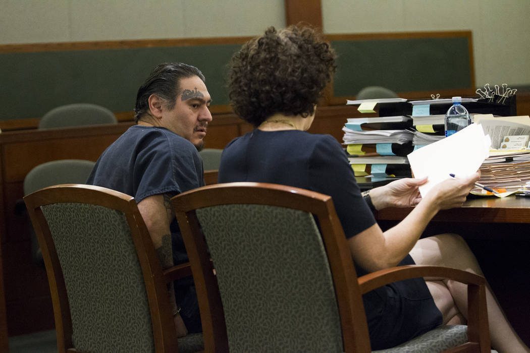 Raymond Padilla, left, charged in the April 2016 killing of construction site security guard Mark Santee, with his defense attorney Monique Mcneill in court for his preliminary hearing at the Regi ...