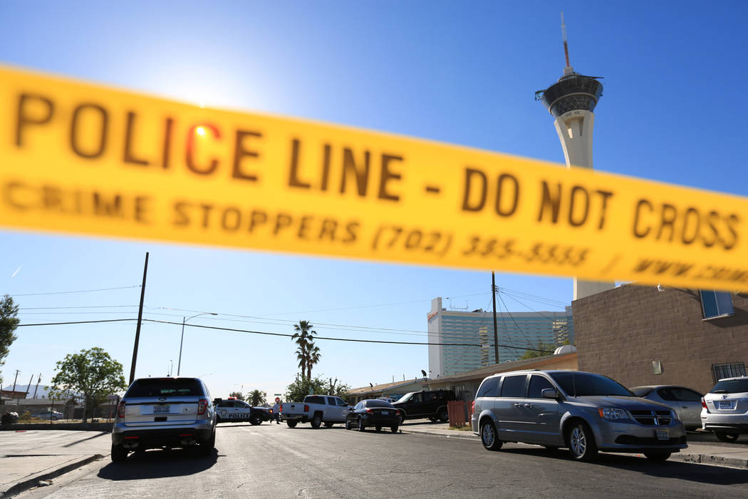 Crime scene tape blocks off the intersection of Chicago Avenue and Fairfield Avenue as police investigate a shooting on Thursday, May 4, 2017, in Las Vegas. Brett Le Blanc Las Vegas Review-Journal ...