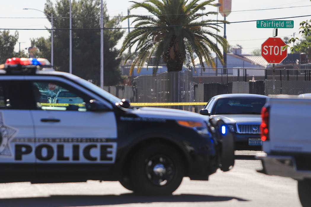 Crime scene tape blocks off the intersection of Chicago Avenue and Fairfield Avenue as police investigate a shooting on Thursday, May 4, 2017, in Las Vegas. Brett Le Blanc Las Vegas Review-Journal ...