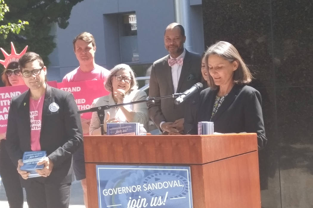 Sen. Senator Julia Ratti, D-Sparks, talks Friday in front of the Legislative Building about her bill to improve access to birth control. Senate Bill 233 has been passed by both chambers and suppor ...