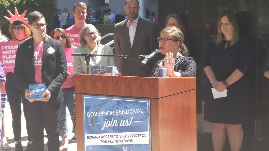 Caroline Mello Roberson of NARAL Pro-Choice Nevada talks Friday to the group gathered in front of the Legislative Building to show support for legislation to improve access to birth control. Senat ...