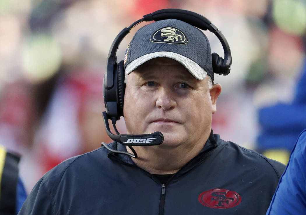 In this Jan. 1, 2017, file photo, San Francisco 49ers head coach Chip Kelly stands on the sideline during the second half of an NFL football game against the Seattle Seahawks in Santa Clara, Calif ...