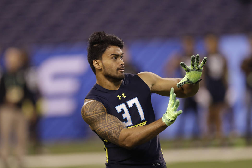 Washington State defensive back Shalom Luani runs a drill at the NFL football scouting combine Monday, March 6, 2017, in Indianapolis. (AP Photo/David J. Phillip)