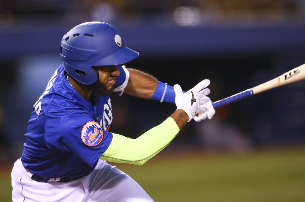 Las Vegas 51s infielder Amed Rosario (1) hits the ball against Fresno during the opening day game at Cashman Field in Las Vegas on Tuesday, April 11, 2017. (Chase Stevens Las Vegas Review-Journal  ...