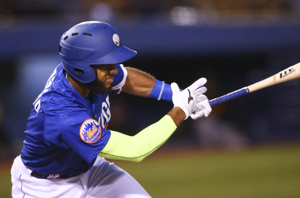 Las Vegas 51s infielder Amed Rosario (1) hits the ball against Fresno during the opening day game at Cashman Field in Las Vegas on Tuesday, April 11, 2017. (Chase Stevens Las Vegas Review-Journal ...