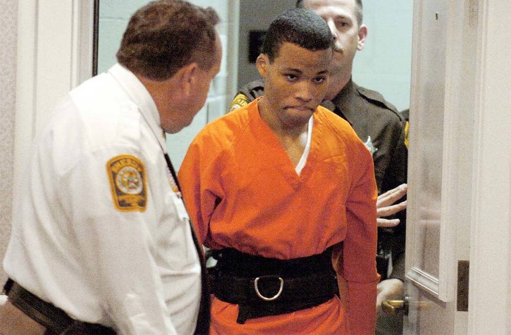 Lee Boyd Malvo enters a courtroom in the Spotsylvania, Va., Circuit Court on Oct. 26, 2004. A federal judge has tossed out two life sentences for Malvo and ordered Virginia courts to hold new sent ...
