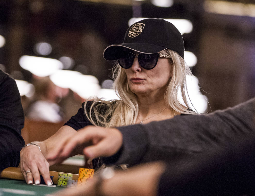 A woman looks at her hand during the opening of the World Series of Poker at the Rio Convention Center on Wednesday, May 31, 2017. Patrick Connolly Las Vegas Review-Journal @PConnPie