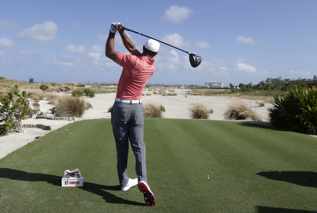 Tiger Woods hits from the sixth tee during the Pro-Am at the Hero World Challenge golf tournament, Wednesday, Nov. 30, 2016, in Nassau, Bahamas. (Lynne Sladky/AP)