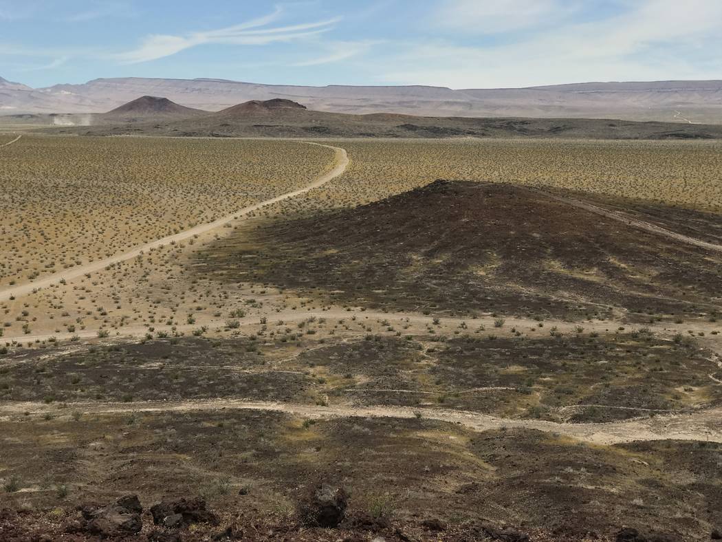 The view north from Little Cones across Crater Flat shows Red Cone and Black Cone in the distance in front of Yucca Mountain, May 22, 2017. Keith Rogers Las Vegas Review-Journal