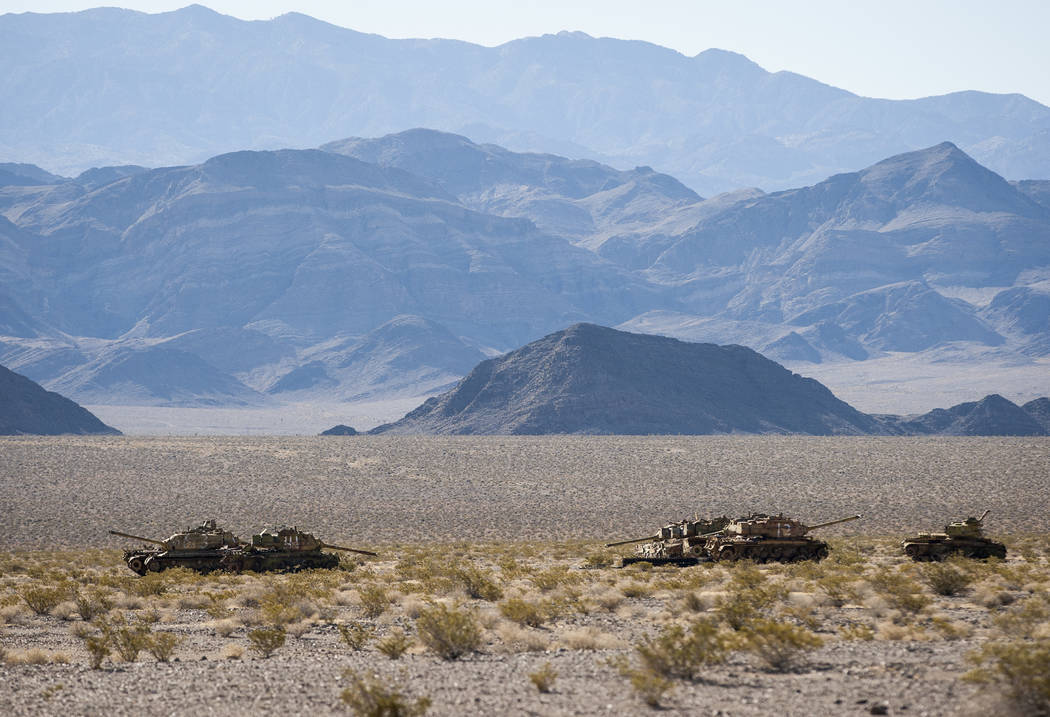 Tanks used as targets for depleted uranium bullets sit in the sun at the Nevada Test and Training Range on Sunday, May 21, 2017, waiting for the day when they will be cleaned up and repurposed. Pa ...