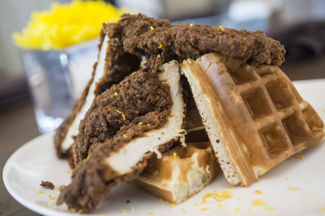 The fried chicken and waffles at DW Bistro on Sunday, May 28, 2017, at The Grammercy, in Las Vegas. Benjamin Hager Las Vegas Review-Journal @benjaminhphoto
