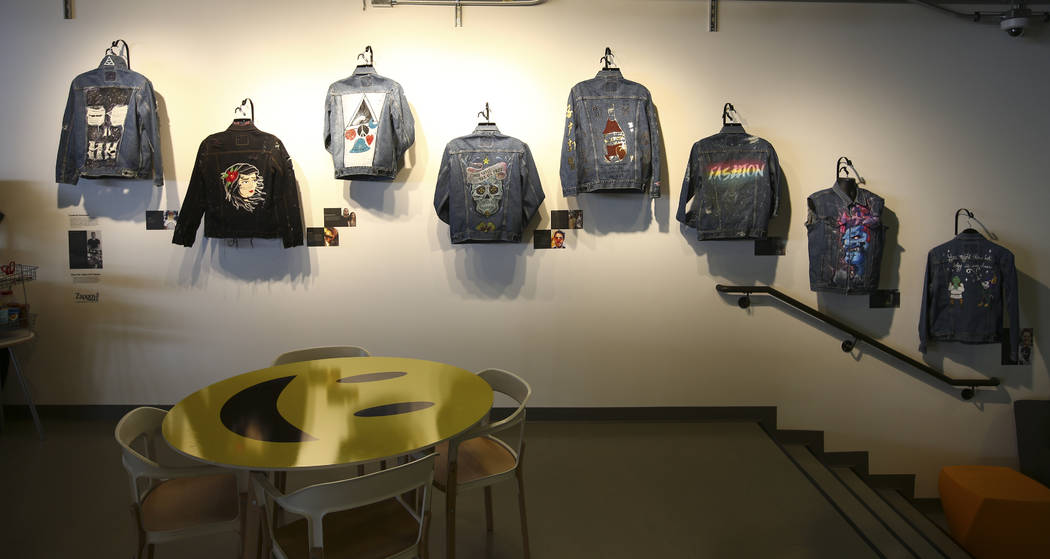 Denim jackets decorated by employees are displayed in the gift shop area at Zappos headquarters in downtown Las Vegas on Thursday, June 1, 2017. Chase Stevens Las Vegas Review-Journal @csstevensphoto